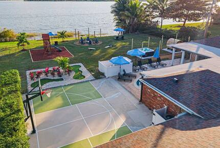 Waterfront Retreat with Pool, Pickleball & Sauna - West Palm Beach, Florida