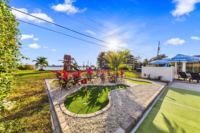 Waterfront Retreat with Pool, Pickleball & Sauna - West Palm Beach, Florida