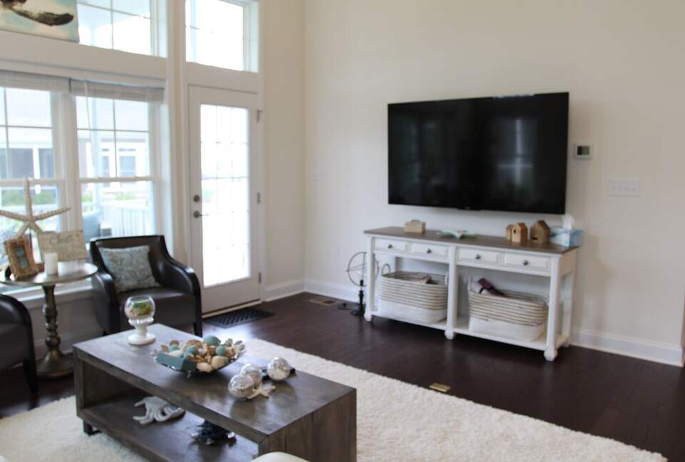 Large gathering space with patio access, streaming device
