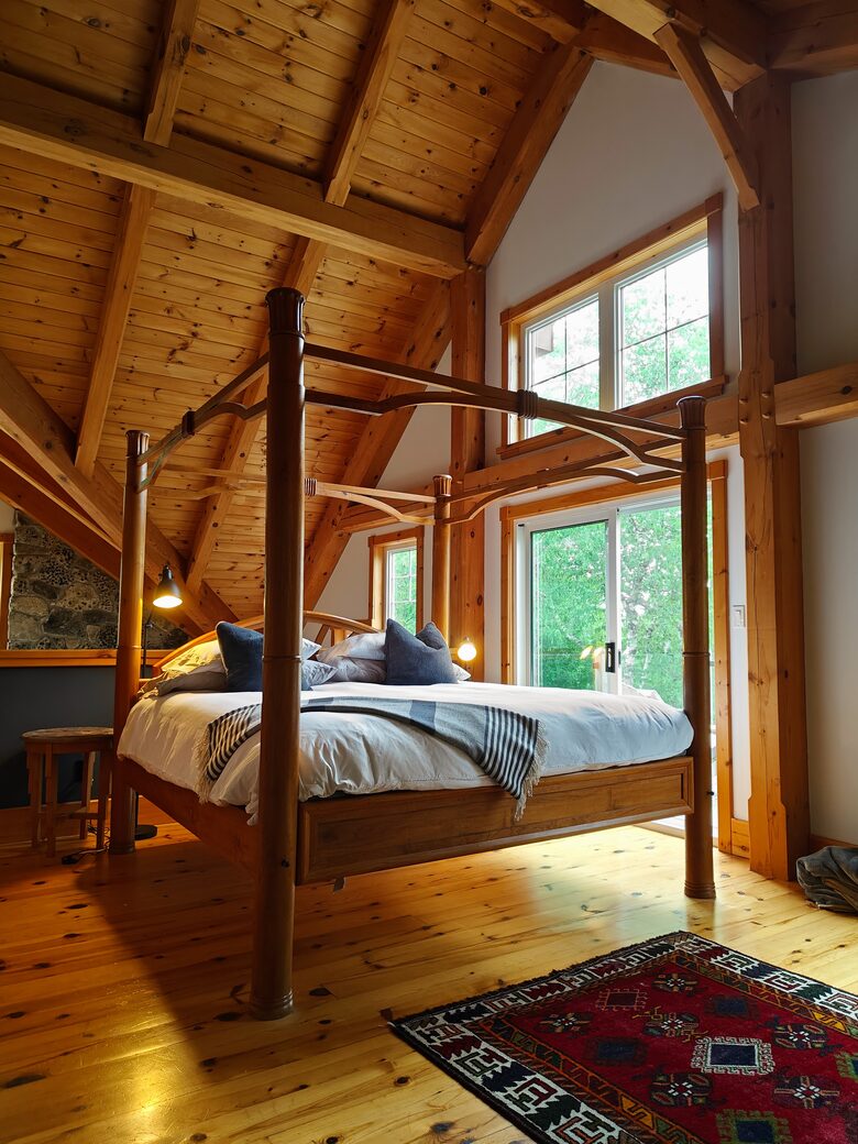 Primary Suite with lake views and private balcony