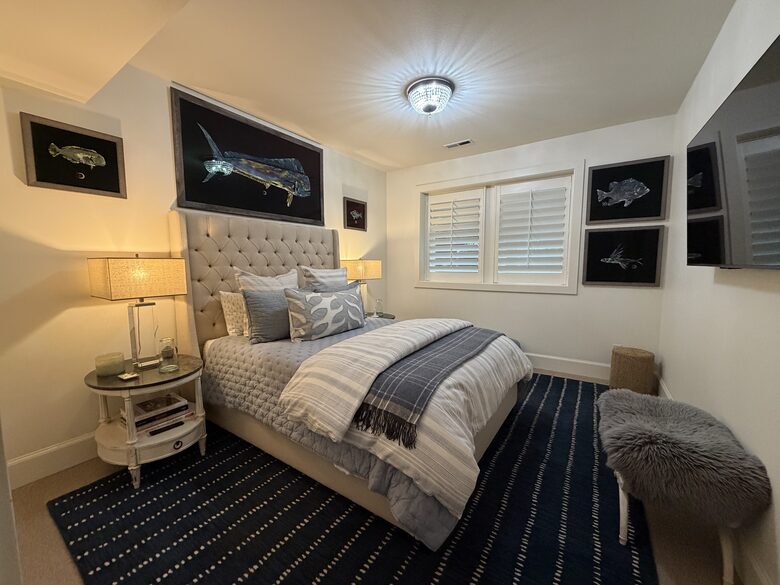 Lower Level Bedroom with Queen Size Bed and Smart Television