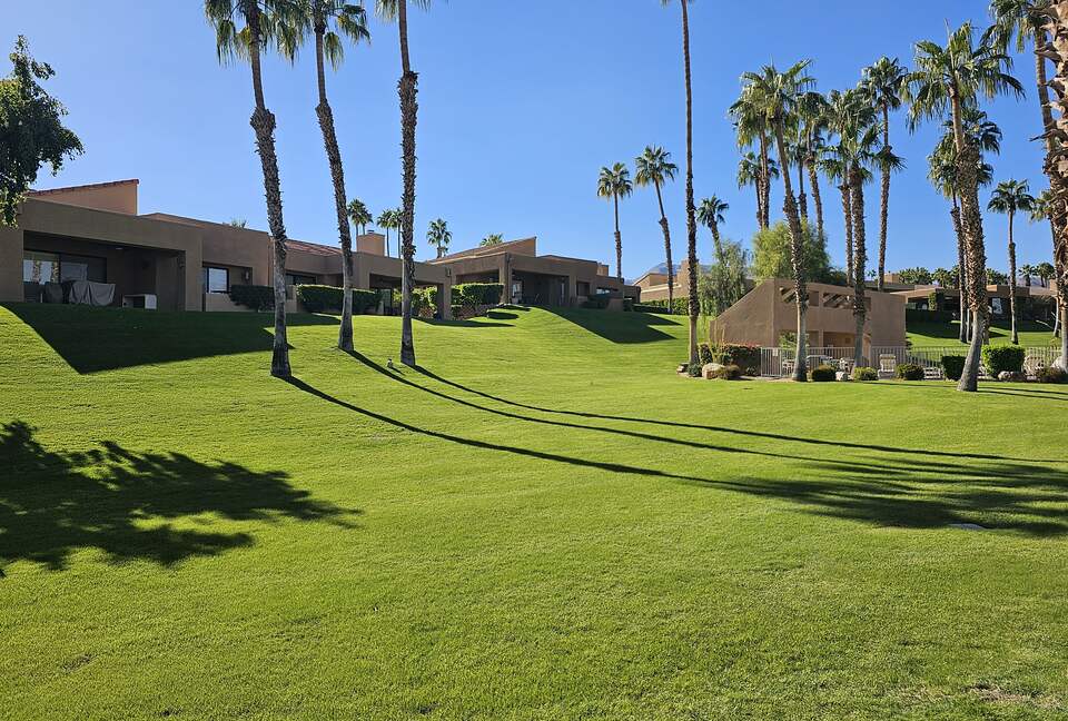 View from the patio to the pool complex