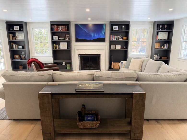 Main living room with fireplace and TV