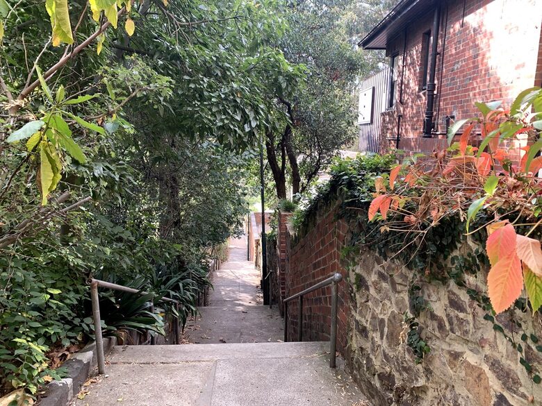 100 meters down the stairs to the bus stop and Yarra River