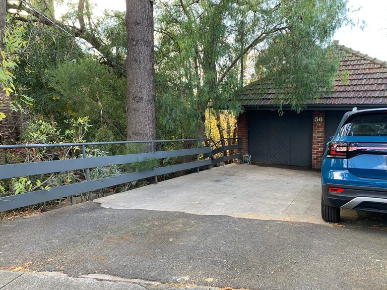 Parking for two cars on left side of driveway.