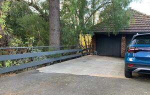 Parking for two cars on left side of driveway.