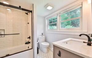First Floor Bathroom with Tub and Shower