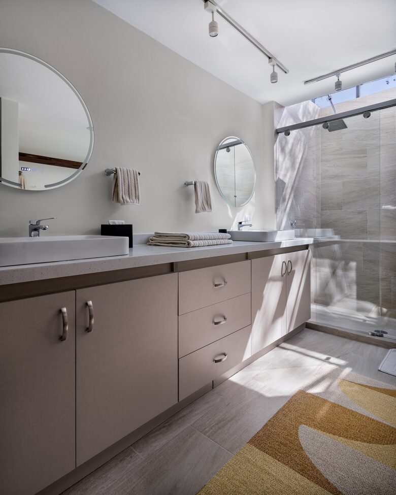 Primary bedroom ensuite bath with skylight shower