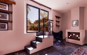 Entrance to second bedroom private patio/garden with pool view