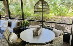 secluded patio leads to path to beach
