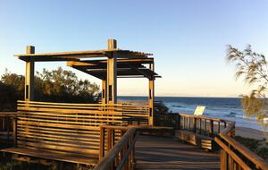Sunset over the beach boardwalk