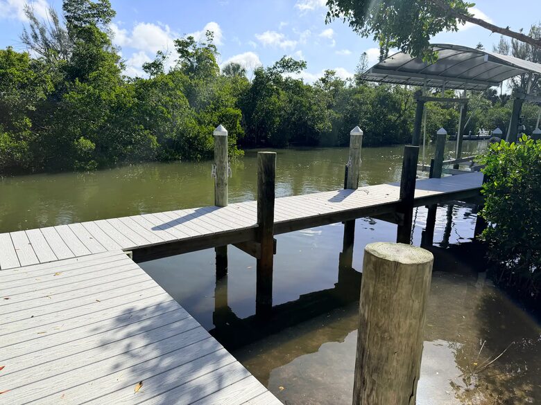 Secluded Gulf Retreat on Palm Island with Private Pool, Dock, Deeded Beach Access ! - Placida, Florida