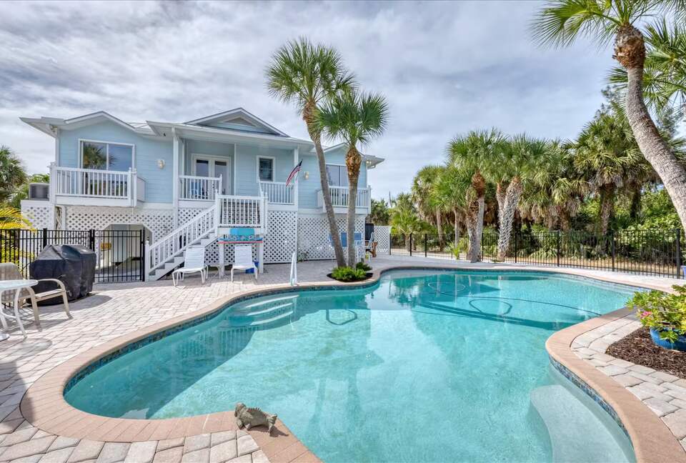 Secluded Gulf Retreat on Palm Island with Private Pool, Dock, Deeded Beach Access ! - Placida, Florida