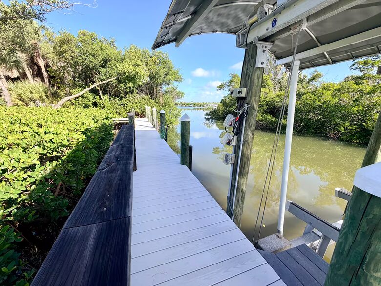 Secluded Gulf Retreat on Palm Island with Private Pool, Dock, Deeded Beach Access ! - Placida, Florida