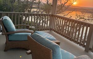 Master level outdoor sitting area with marsh views