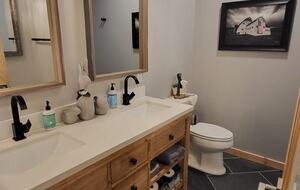 Guest bathroom attached to queen bedroom