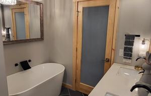Guest bathroom attached to queen bedroom