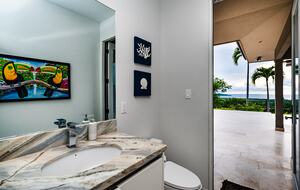 Pool Bathroom with Door to Deck Open