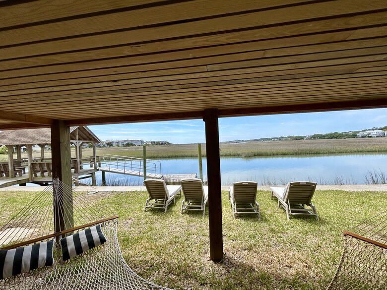 Ground Floor Waterfront Lounge with Hammocks, Bed Swing & Chaises