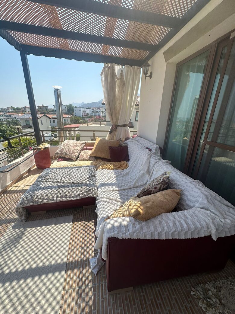leather loungue couches on top balcony with sea views