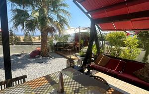 Hollywood swing chair and Bar garden view
