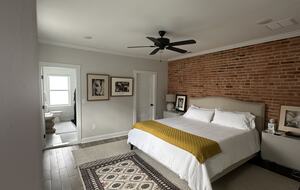 Primary bedroom with king bed and en-suite bath
