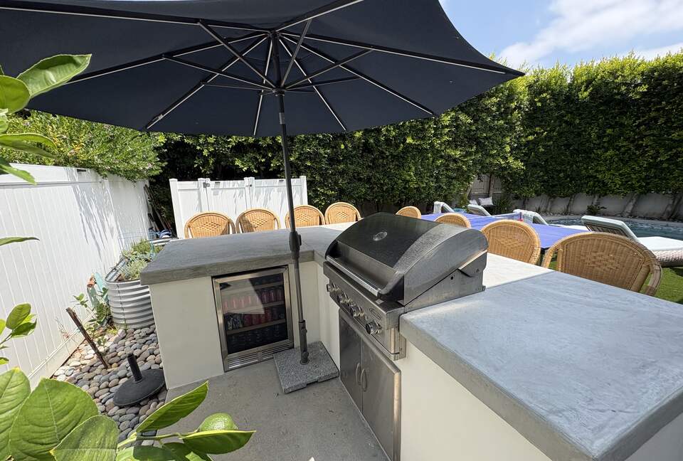 Island with seating for 8; BBQ; outdoor fridge