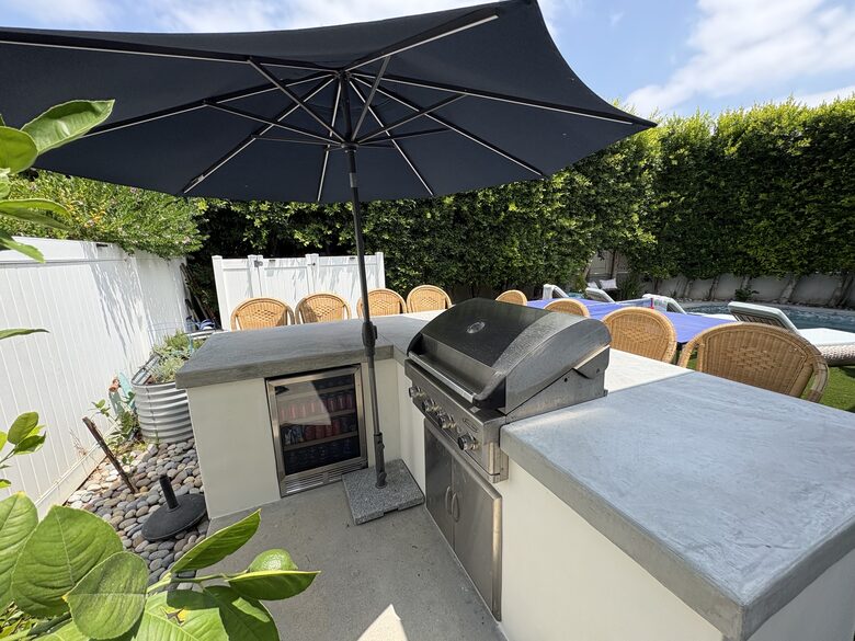 Island with seating for 8; BBQ; outdoor fridge