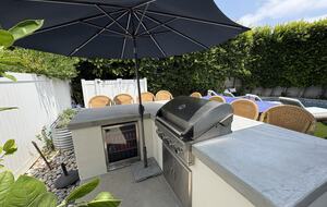Island with seating for 8; BBQ; outdoor fridge