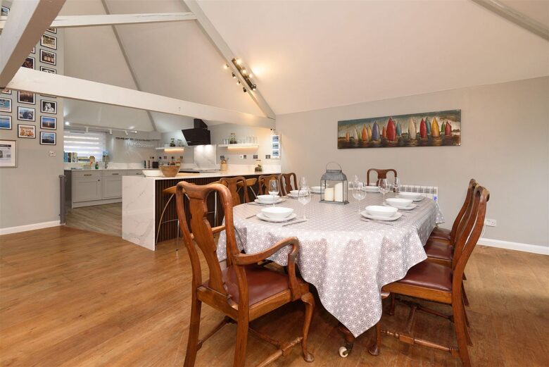Open to the kitchen and bar
