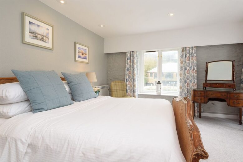 Watch the boats slide past from bed