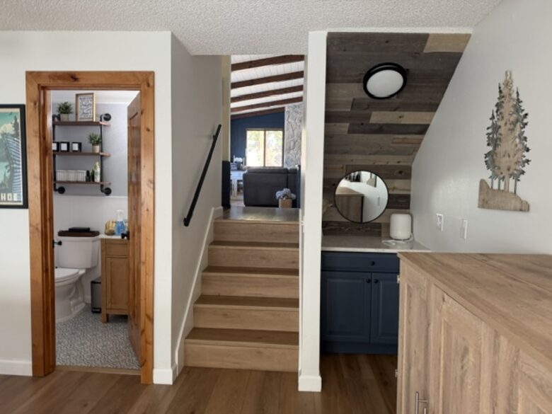 Half bath and walk way to the livingroom and kitchen