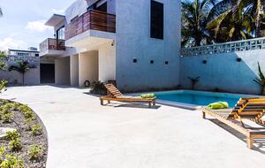 Modern Yucatán Beach House with Rooftop Pool & Direct Sand Access - Chuburná, Mexico