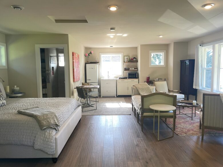 Separate Studio steps from house- king bed, bath, and kitchenette.
