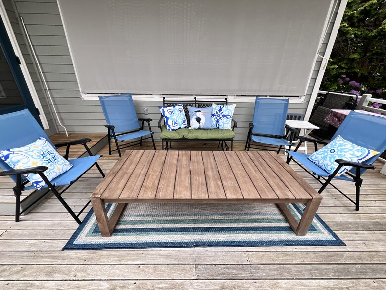 Bay view deck seating area, overlooks large lawn