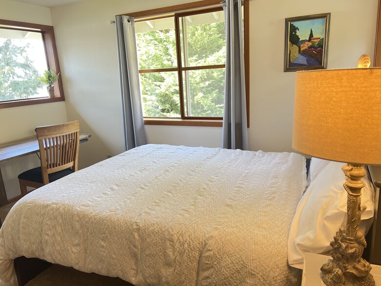 2nd floor queen, waterfront view and desk.