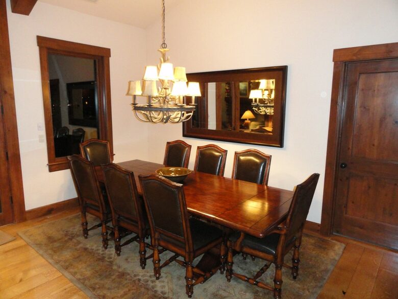 Dining area sets 8, plus 4 at counter and 2 at game table