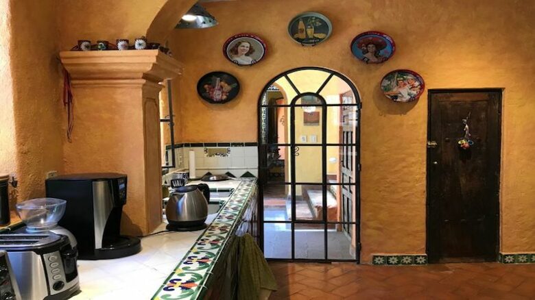 Folk art and tile in kitchen