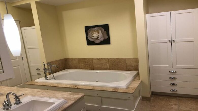 Master bathroom with glass shower and separate tub
