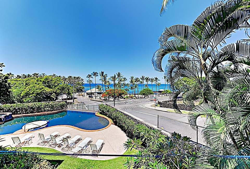 Beach condo view of pool and ocean