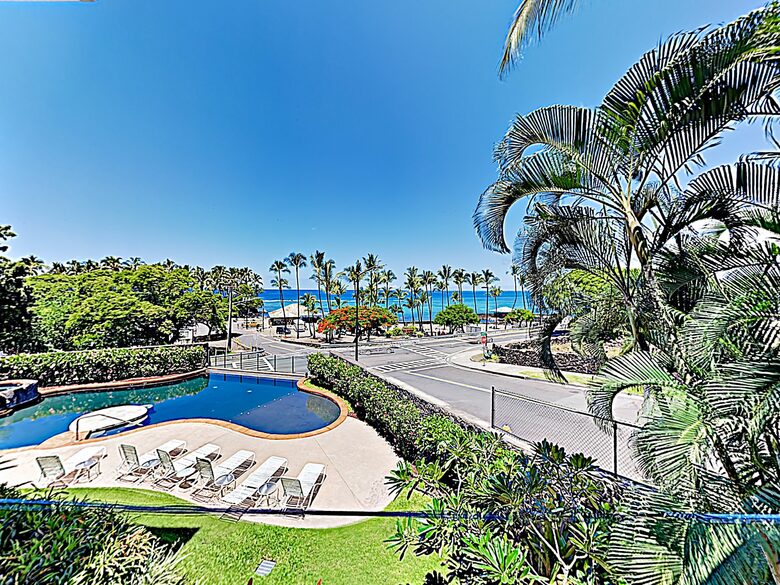 Beach condo view of pool and ocean