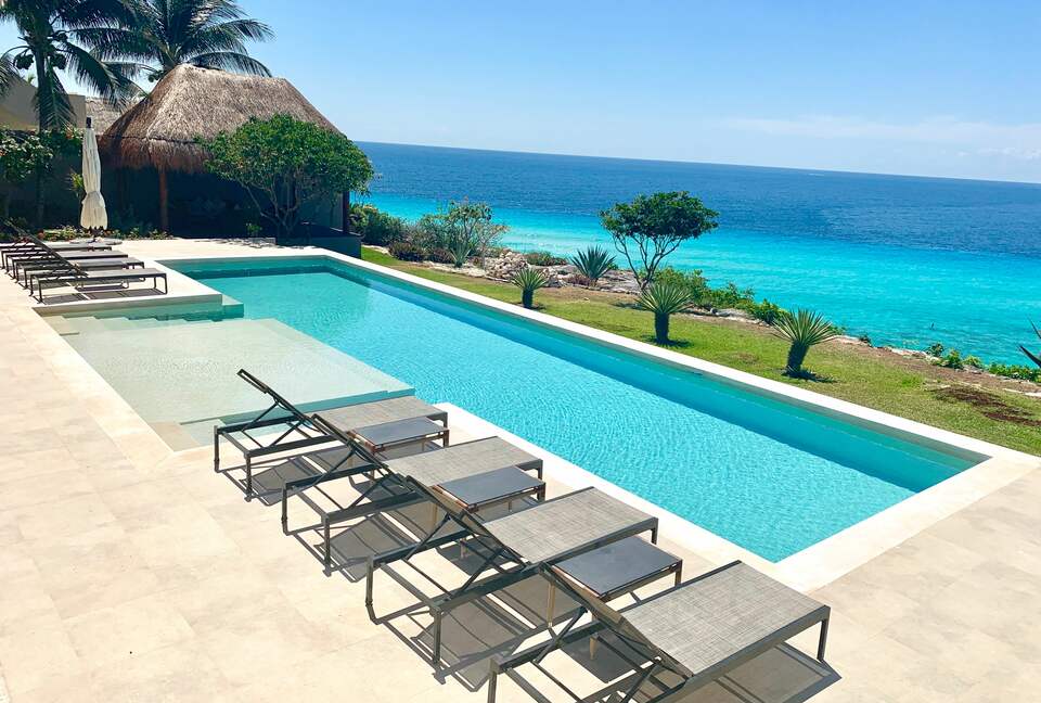 Private cliffside heated pool with views of Cancun