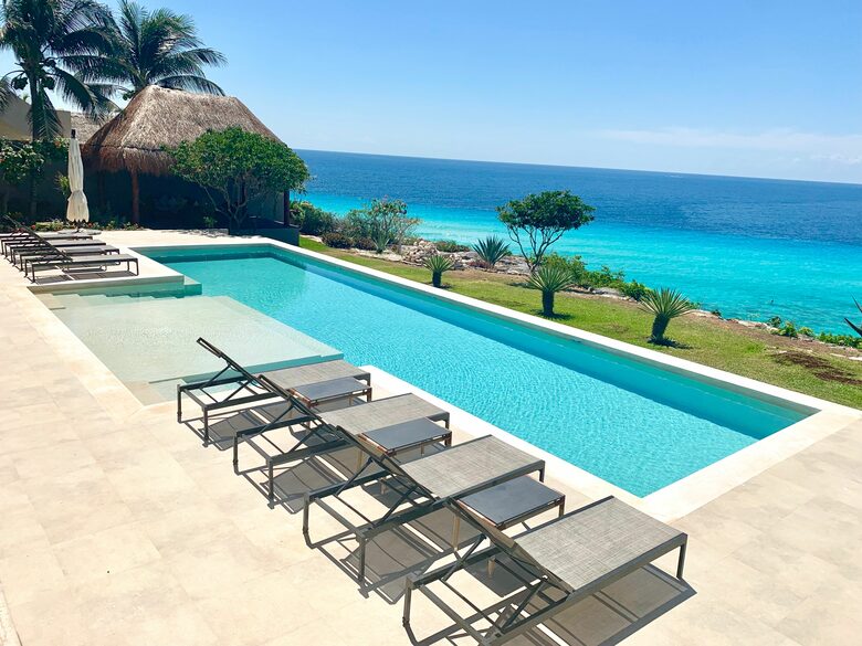 Private cliffside heated pool with views of Cancun