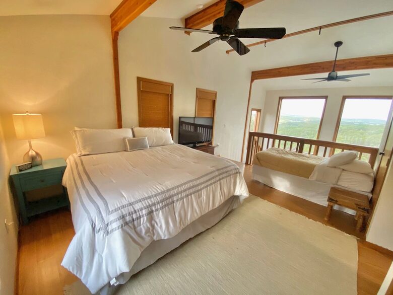 Loft bedroom with king bed and twin bed