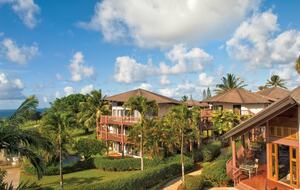 Home exchange at Wyndham Ka'Eo Kai Resort surrounded by palm trees