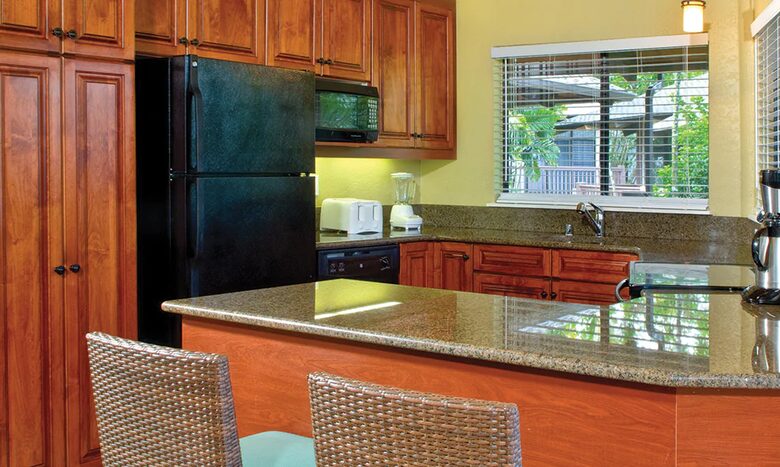 Home exchange at Wyndham Ka'Eo Kai, kitchen with granite countertops