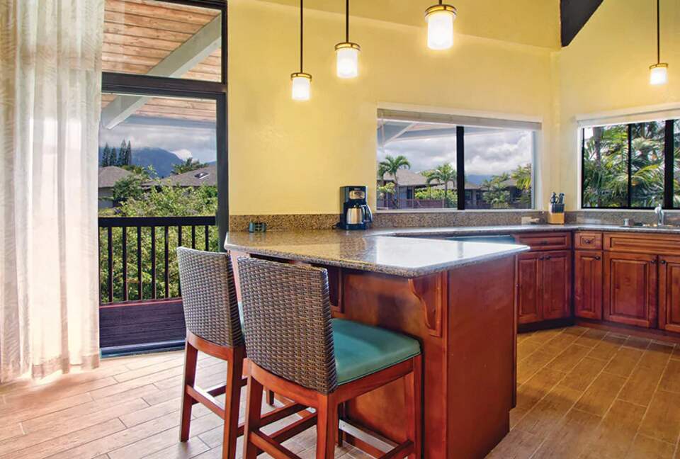 Home exchange at Wyndham Ka'Eo Kai, full kitchen with bar seating