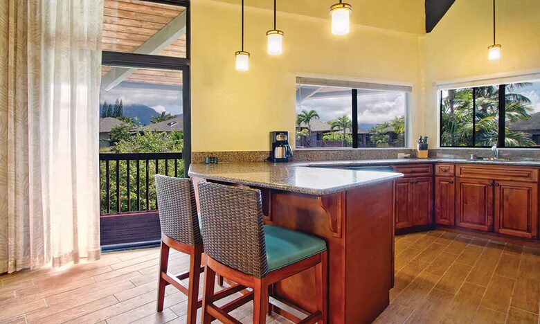 Home exchange at Wyndham Ka'Eo Kai, full kitchen with bar seating