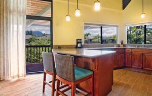 Home exchange at Wyndham Ka'Eo Kai, full kitchen with bar seating