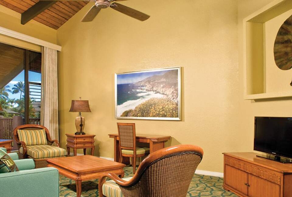 Home exchange at Wyndham Ka'Eo Kai, furnished living room with TV